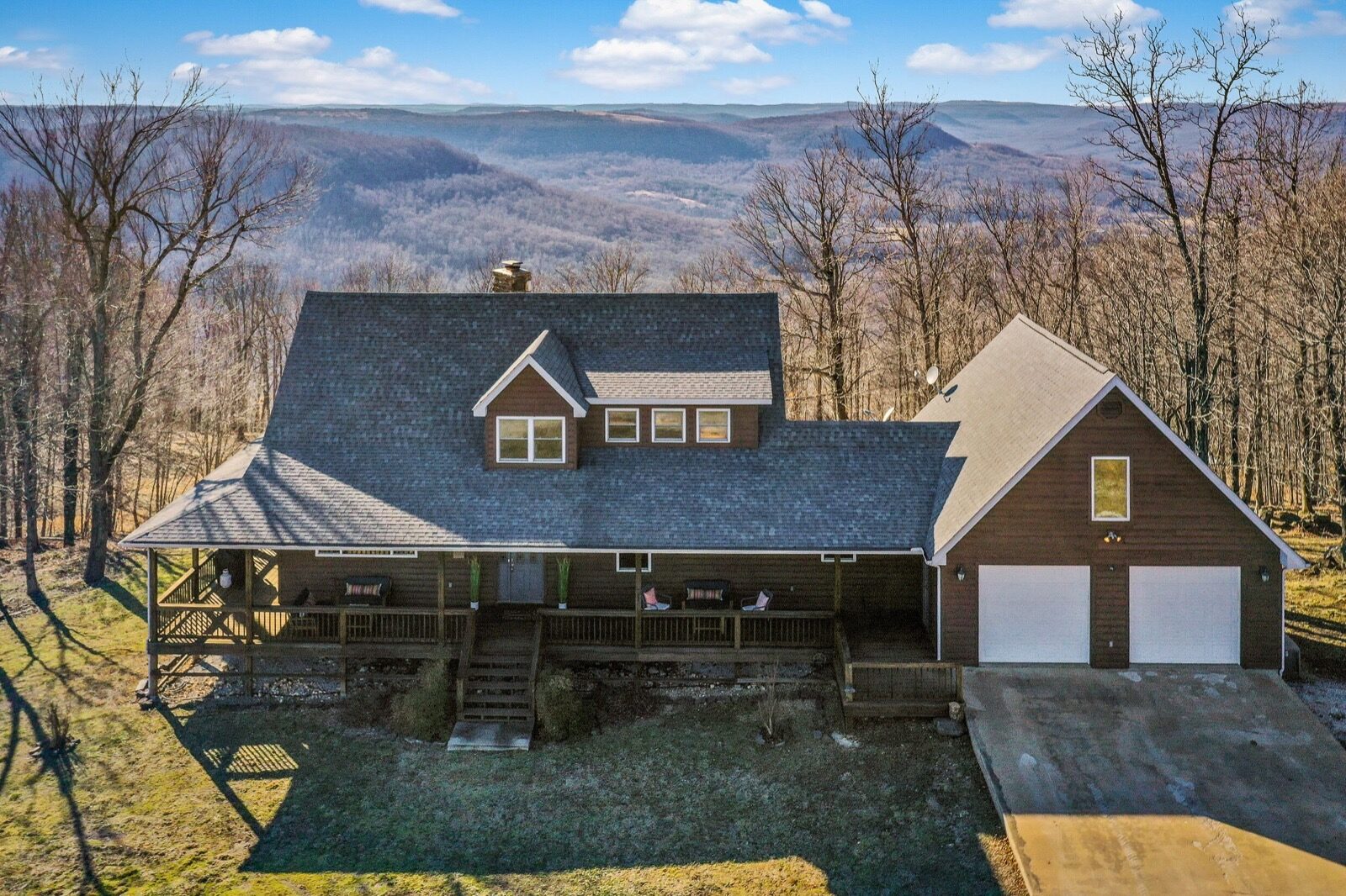 Aerial view of Winston's View cabin with Ozark mountain backdrop near Jasper, Arkansas